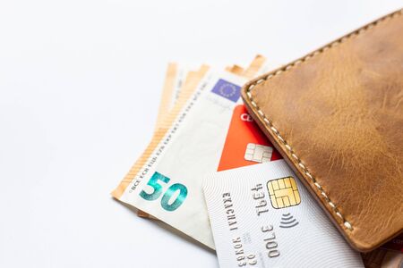 Euro money with credit card on white background business finance