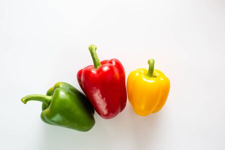 Sweet chilli pepper close up on white background colorful vegetableの写真素材