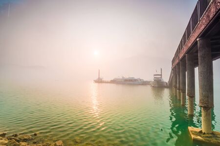 Sun moon lake sunrise with fog in Nantou, Taiwan
