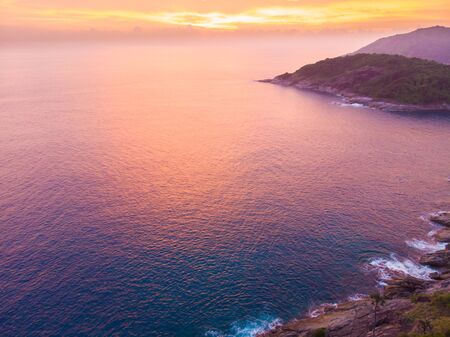 Aerial view sunset sea bay coast line colorful sky in Phuket Thailand