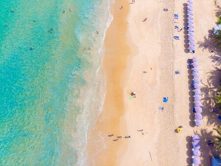 Sea beach azure water with coconut palm tree aerial view, Phuket Thailandの写真素材