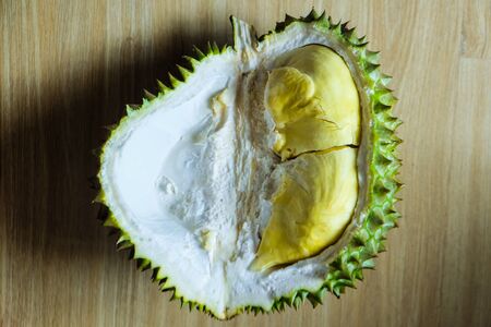 Yellow durian tropical fruit on wood background, Thailand fruit