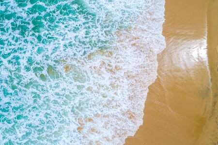 Sea wave on white sand beach turqouise water Phuket Thailand