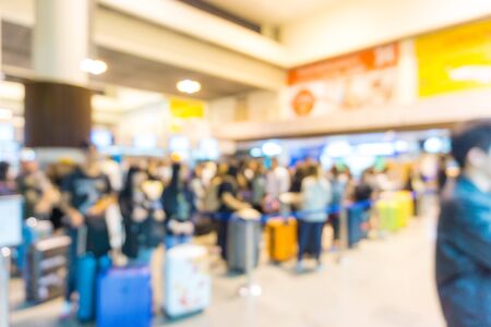 Abstract blurred indoor airport with people check in travel conceptの写真素材