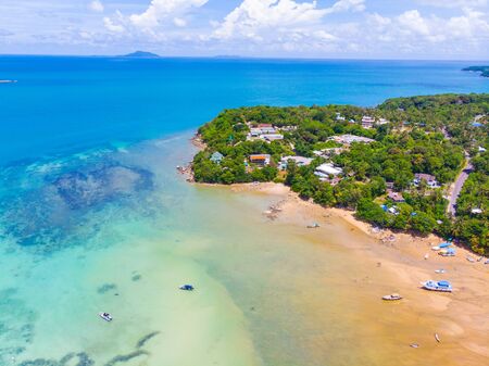 Sea wave beach turquoise water with tourist summer vacation concept aerial viewの写真素材