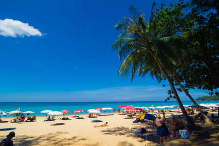 Colorful beach chair with umbrella on white sand beach vacation conceptのeditorial素材