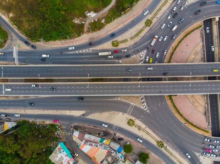 Circular junction cross transport road with car movement aerial viewの写真素材