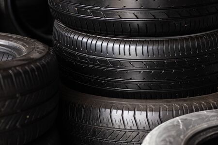 Satck of car tires texrture background  in automobile store, New black tire texture