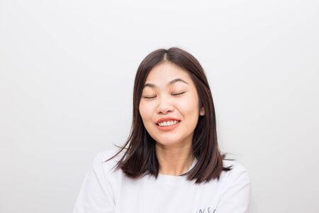 Asian beautiful smiling women portrait on white background healthy lifeの写真素材