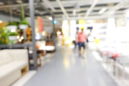 Abstract blurred people shopping in supermarket modern store business backgroundの写真素材