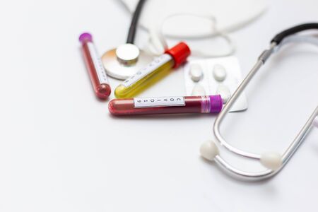 Various medical equipment with blood and Covid 19 vaccine isolated on white backgroundの写真素材