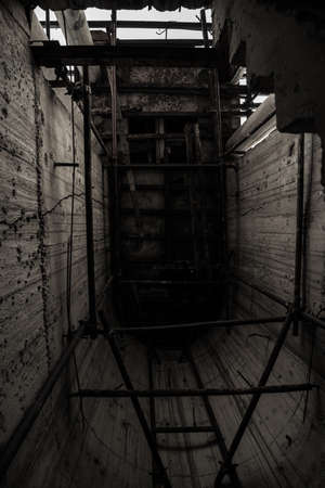 Old ruin high rise building effect from economy downturn in Thailandの写真素材