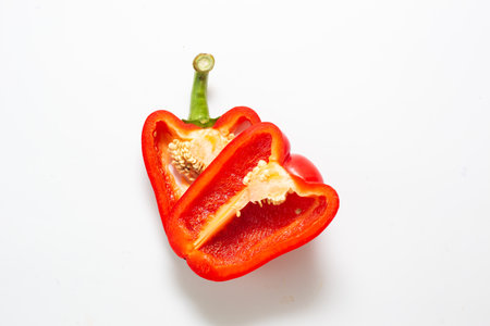 Red slice big spicy chilli on white background