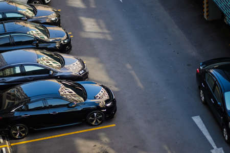 Modern car parking lot on road of condominium building, Car park with copy spaceの写真素材