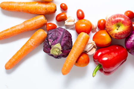 Top view various colorful vegetables and fruits isolated on white background, creative flat layout. Concept of healthy eating.の写真素材