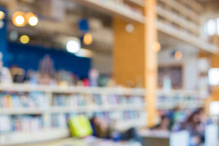 Abstract blurred people sitting in art coffee shop morning light with bokehの写真素材