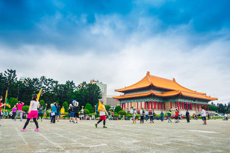 TAIPEI, TAIWAN - MARCH 21: People travel around Chiang Kai-shek Memorial Hall March 21, 2015 in Taipei, TAIWAN, Asia. The building is famous landmark and must see attraction in Taipei.のeditorial素材