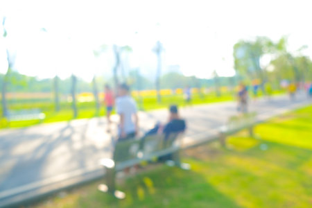 Abstract blurred road park morning sun light green tree backgroudの写真素材