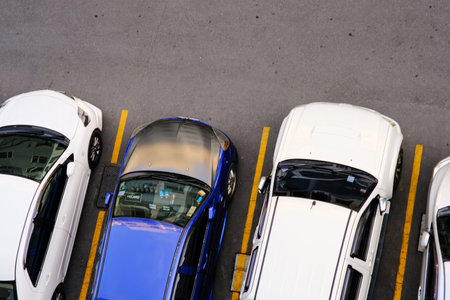 Colorful car parking lot inn modern condo resident aerial view transport businessの写真素材
