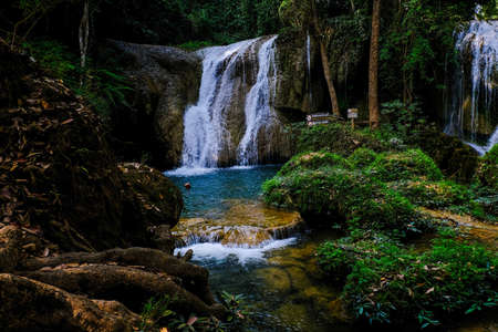 Paradise waterfall in deep  forest turquoise water Phayao Thailandの写真素材