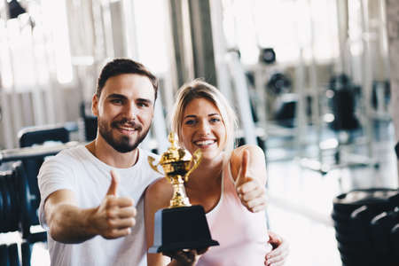 Healthy man and woman  fitness exercising session in gym. Healthy life styleの写真素材