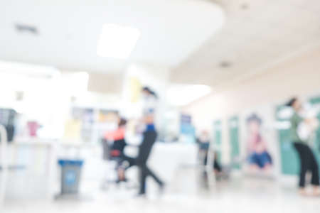 Abstract blurred bokeh indoor clinic hospital with people waiting service healthcare background