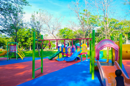 Adorable little boy playing in outdoor park boy exerciseの写真素材