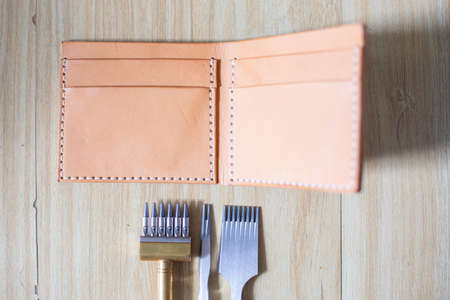 Genuine leather bifold money wallet with crafts tool craftmanship working