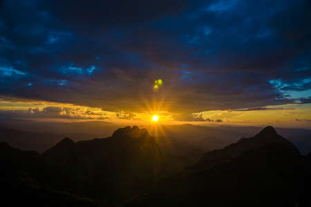 Silhouette sunnset on mountain peak sky with cloud nature landscape