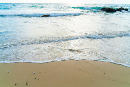 Sea wave beach sunset with cloud summer vacation natue landscapeの写真素材