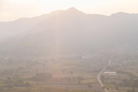 Aerial view mountain field sunrise morning with fogure landscapeの写真素材