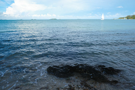White sailboat on sea bay blue sky with cloud summer vacation background