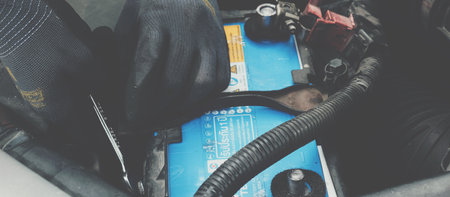 Mechanical man ahnd check carbattery and maintenance transport industryの写真素材