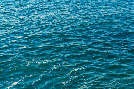 Deep turquoise water wave backgriund nature texture