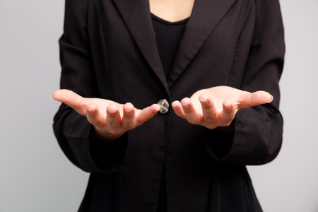 Asian business woman show welcome empty hand on white background copyspace ad useの写真素材