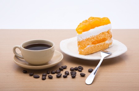 cup of coffee and delicious cake on white backgroundの写真素材