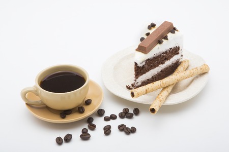 cup of coffee and delicious cake on white backgroundの写真素材