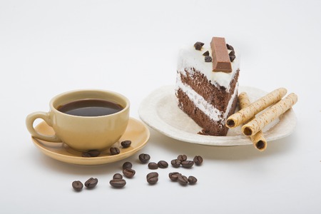 cup of coffee and delicious cake on white backgroundの写真素材