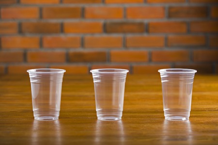 three cup of coffee on wood tableの写真素材