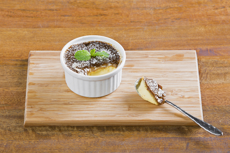 Delicious baked egg custard, topped with nutmeg. A healthy, homely dessert.の写真素材