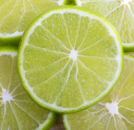 lime slice and lemon on white backgroundの写真素材