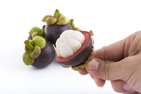 ripe mangosteen isolated on white backgroundの写真素材