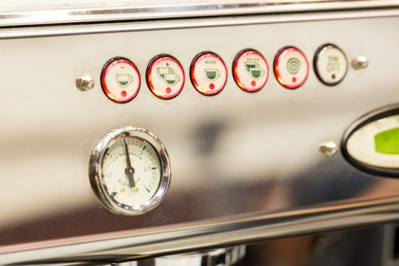 Close-up of coffee machine buttonsの写真素材
