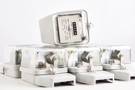 Electric meter power tool isolated from white background.