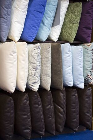 Colorful pillows placed on the floor for sale