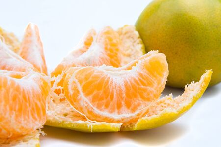 Fresh orange fruit on a white backgroundの写真素材