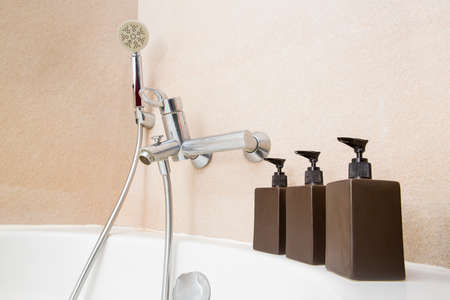 Brown pump bottle, shampoo and liquid soap