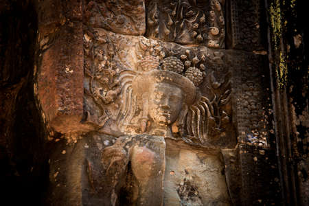 The engraved pattern around Angkor Wat belongs to the Khmer Empire. Located in the center of Angkor...