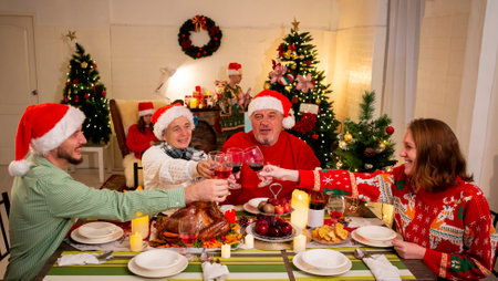 A happy family holds a Christmas party at home on the holiday.の写真素材