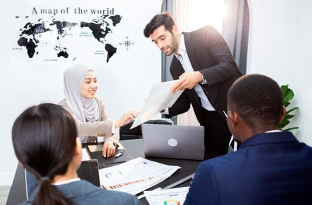 Executives are meeting to plan marketing activities.の写真素材